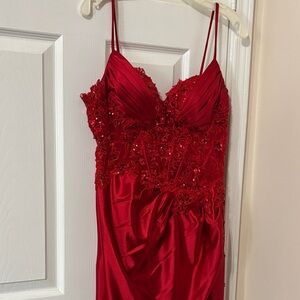 Beautiful red dress. Can be worn to prom or wedding.